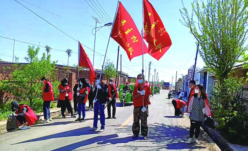 二題圖，村黨支部舉辦黨員志愿服務(wù)活動